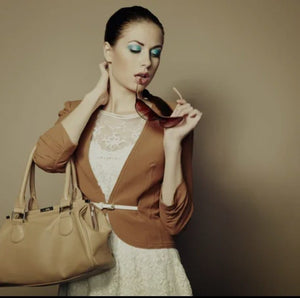 BOLSON DE CUERO OFERTA CON UN PAR DE ARETES XUPIN